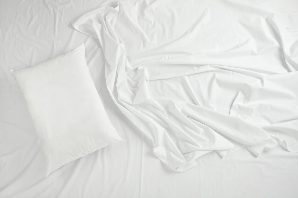 Close up of bedding sheets and pillow