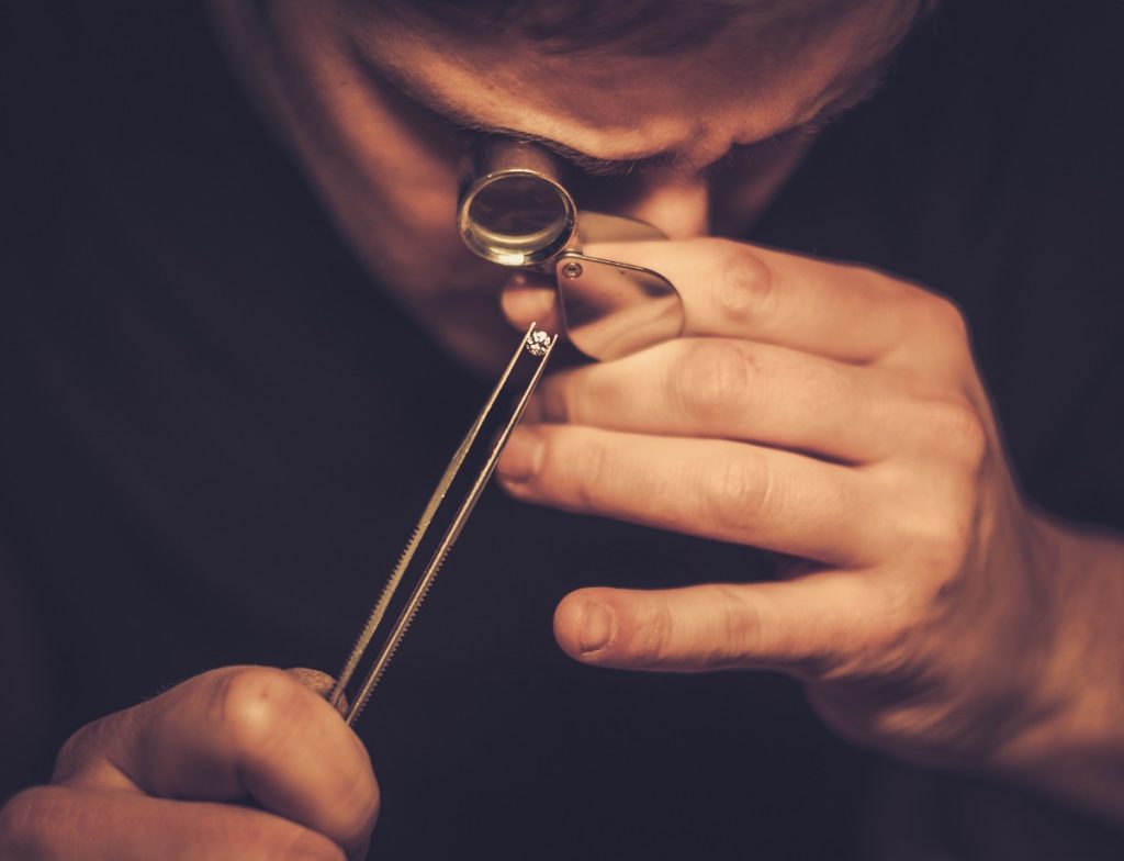 Jeweler examining a diamond