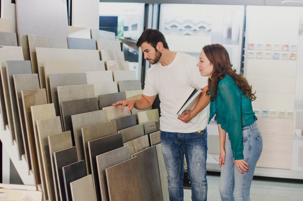 Couple choosing tiles