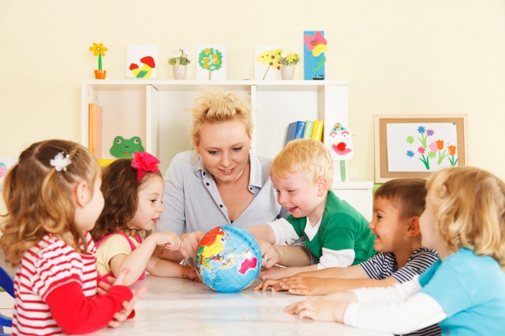 preschool students with teacher