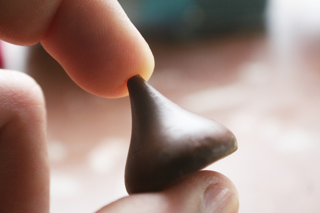 Chocolate Kisses In Hand Close Up