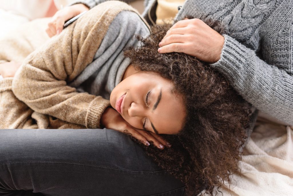 Woman-sleeping-on-lap