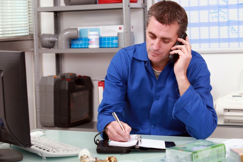 Plumber taking a call