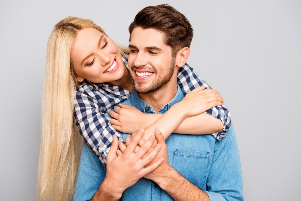 happy couple hugging