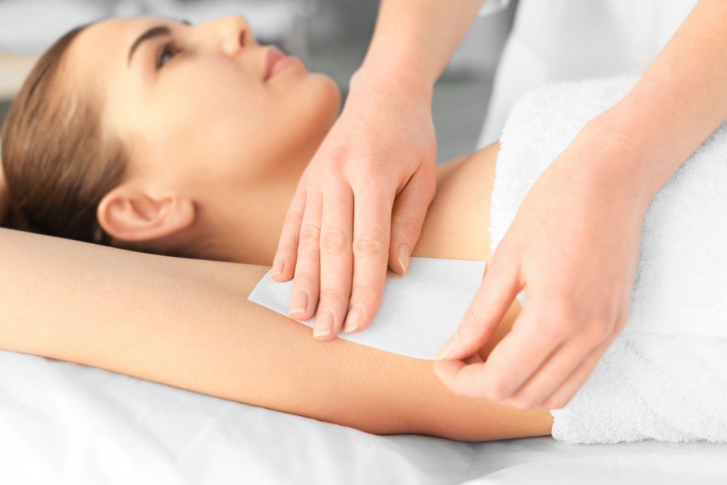 underarm waxing in a spa center