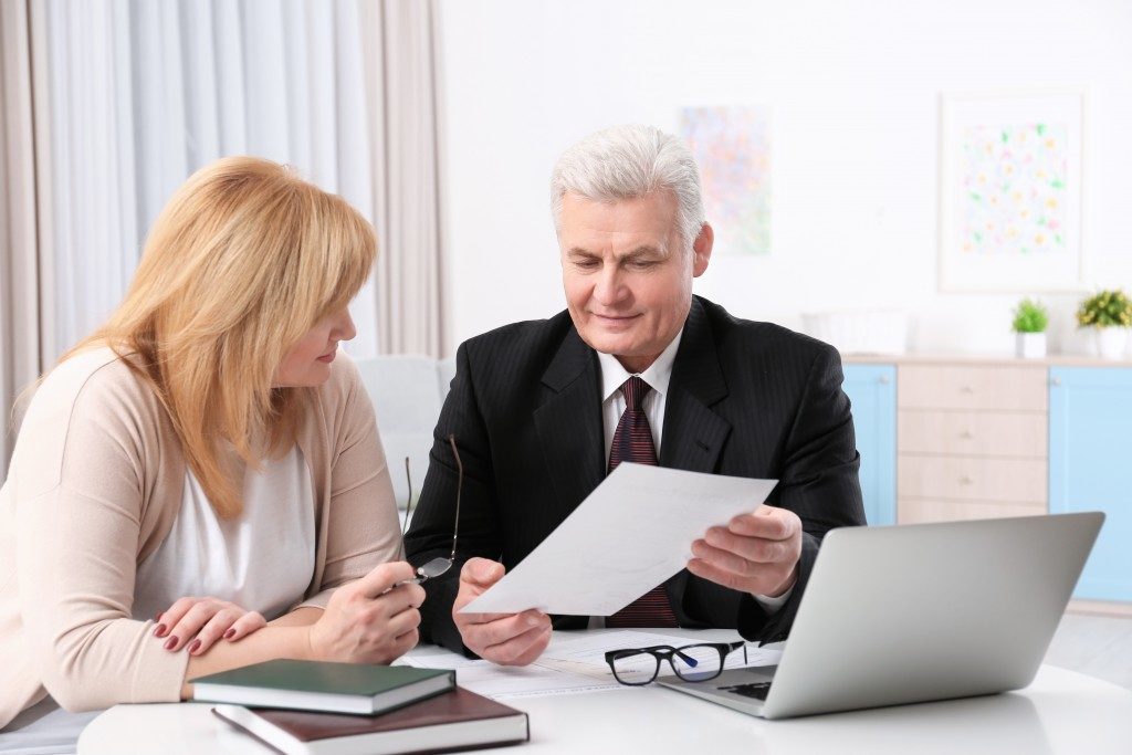 woman talking to a business professional