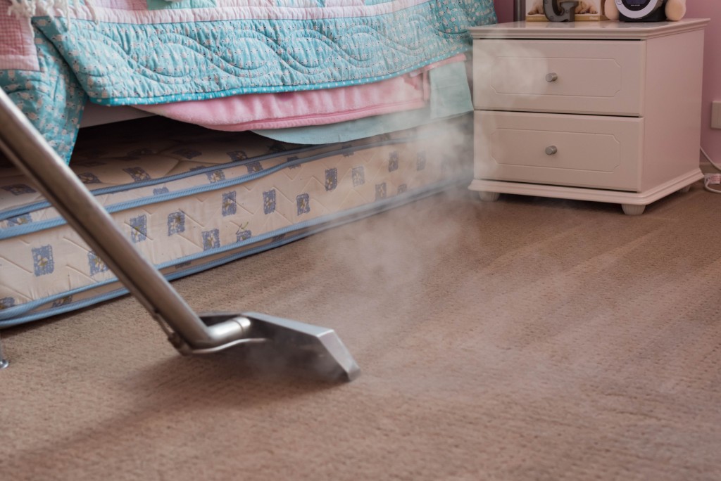 Regularly cleaning the carpet in the bedrooms