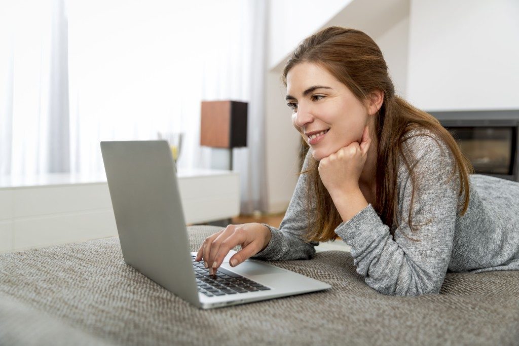 woman watching on laptop