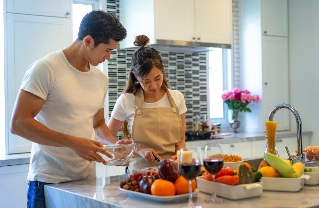 Couple preparing food