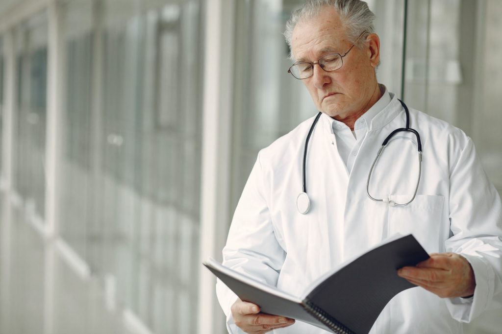 doctor reading a book