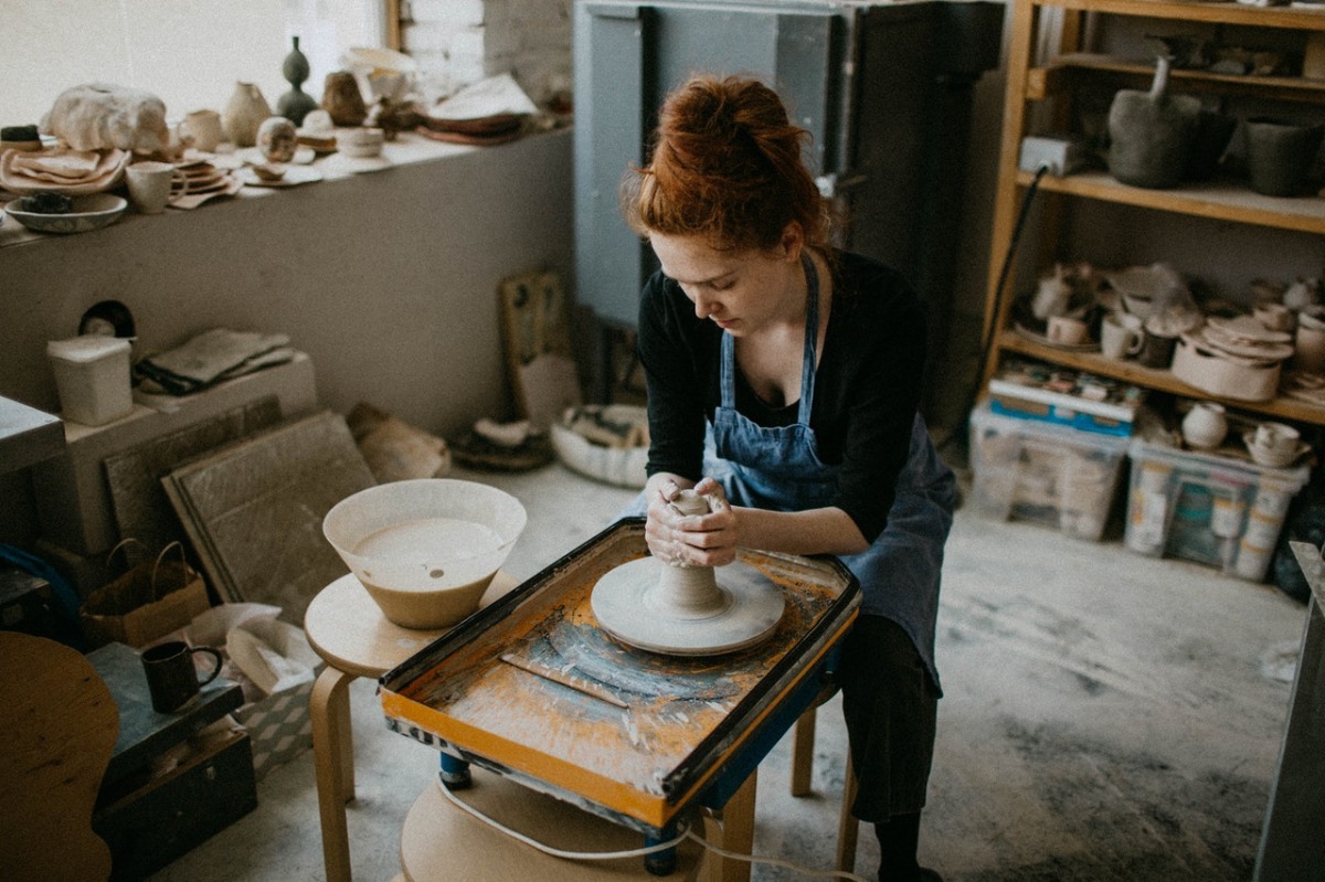 woman doing pottery