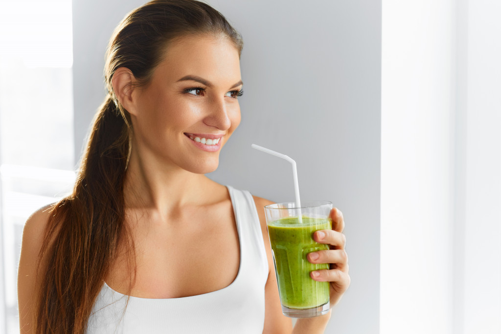 woman drinking healthy drink