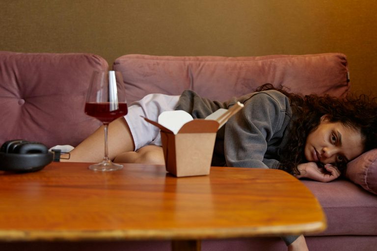 Woman lying down after eating